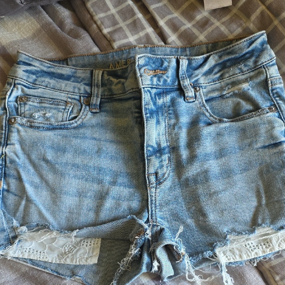 Distressed Light Blue Denim Shorts